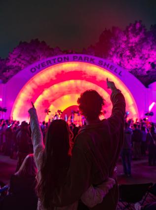 couple watches show at Overton Park Shell