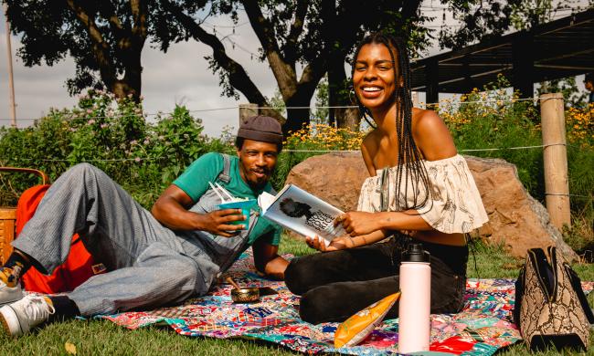 couple has a picnic at River Garden Park Summer