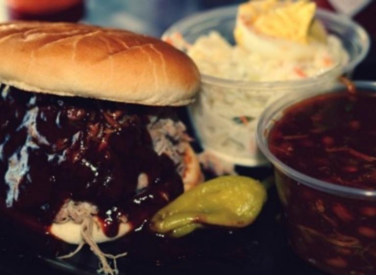 Pulled pork barbecue sandwich with slaw and beans at Germantown Commissary. Photo by Memphis CVB Photo 3