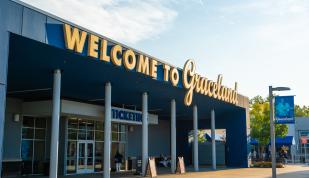 entrance to graceland exhibition center with "welcome to graceland" sign